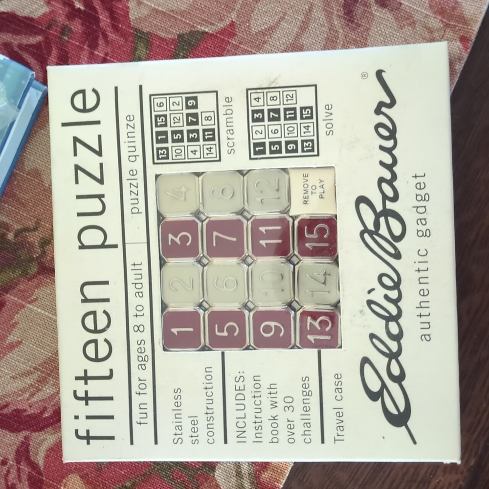 Vintage unopened Eddie Bauer 15 puzzle w/case